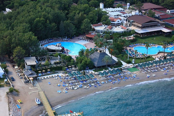 A sprawling resort pool, illustrative of a Caribbean-style crystal lagoon