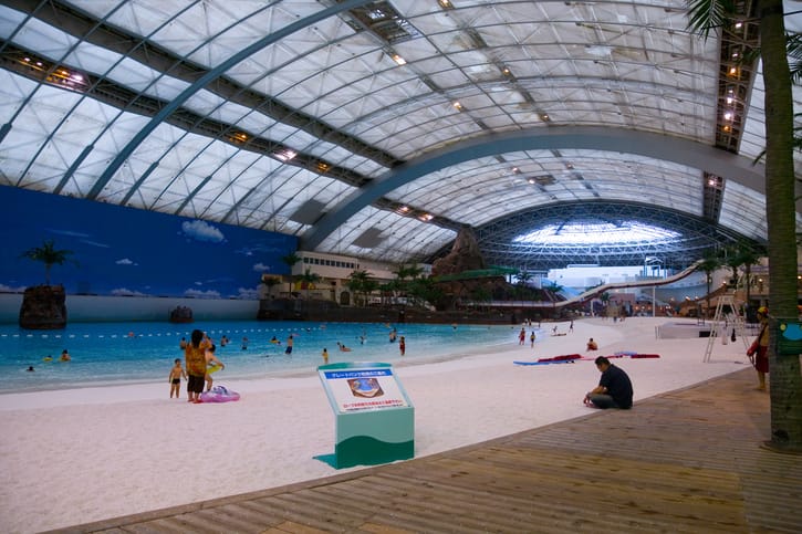 Interior of the Seagaia Ocean Dome indoor water park with its artificial beach in Miyazaki, Japan